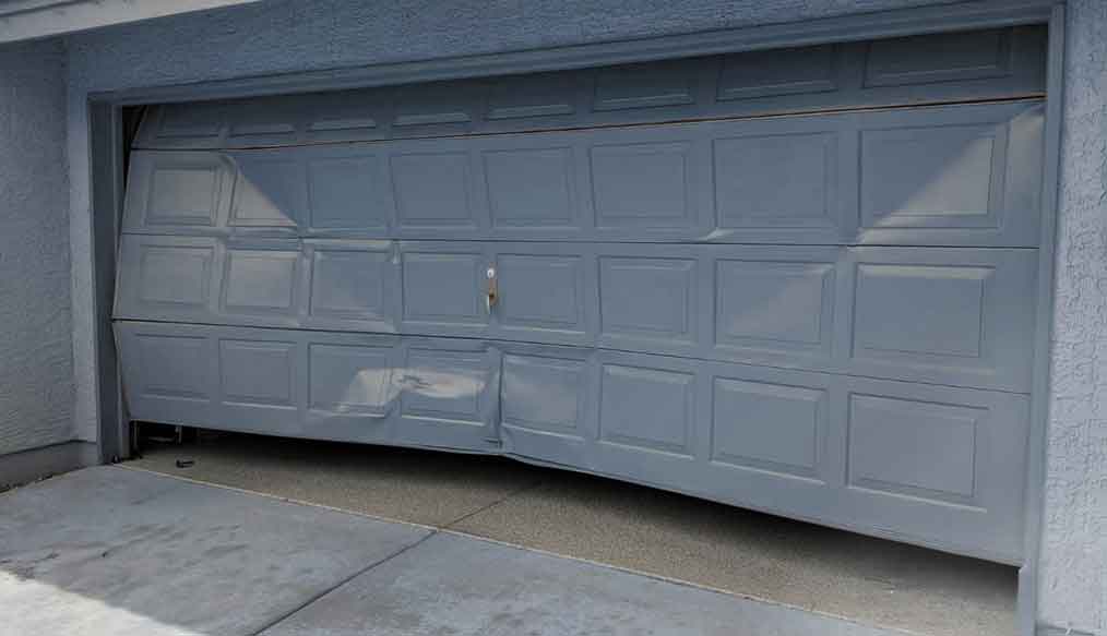 damaged garage door panel replacement